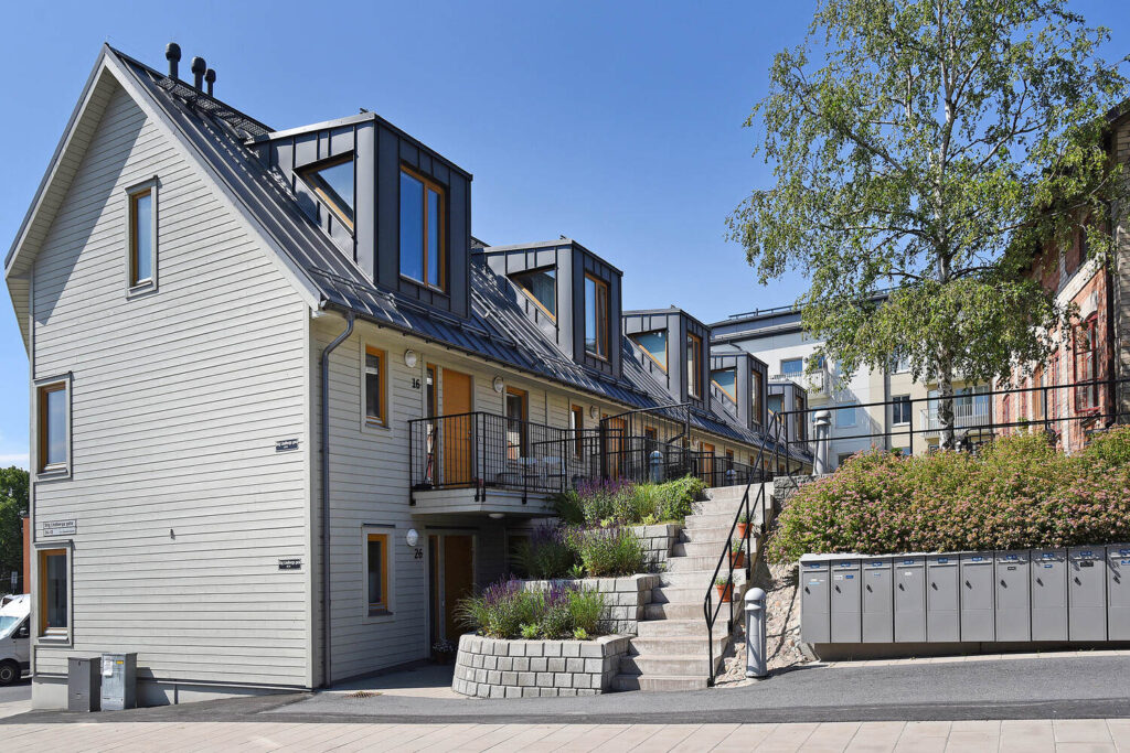 Ommålning av fasad villa. Sundbyberg Storskogen